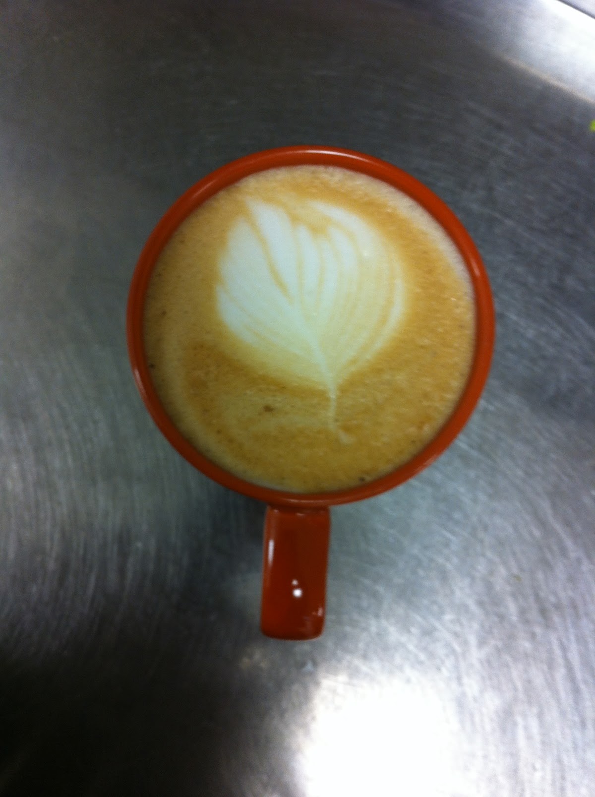 Latte with leaf art at Cegin Café